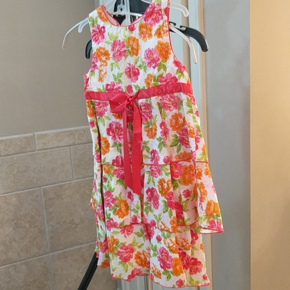 Girls 6 floral summery dress with red ribbon